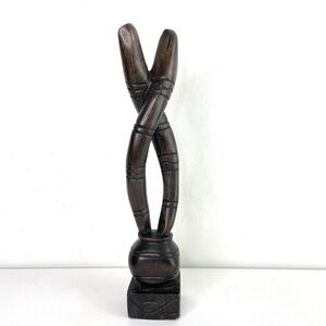 Handmade primitive abstract carved wood sculpture intertwined snake columns